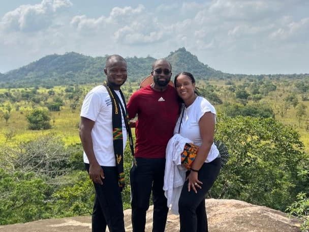 Overlooking the savannah hills in traditional dress